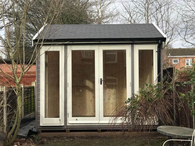 'The Walton' Garden Room with Black Felt Shingle Tiles. Available from Taunton Sheds